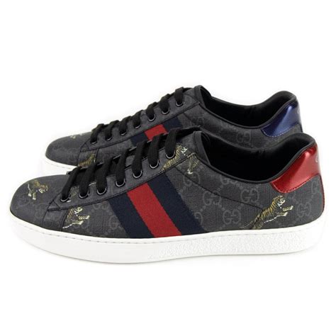 Gucci tiger sneakers black